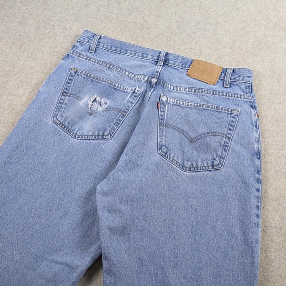 VTG Levi's 560 Jeans‎ Mens 38x34 Baggy Tapered Distressed Light Wash Blue 90s - Picture 1 of 11